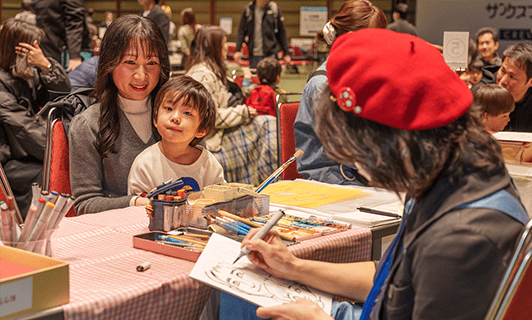 写真 | プロによる似顔絵コーナー